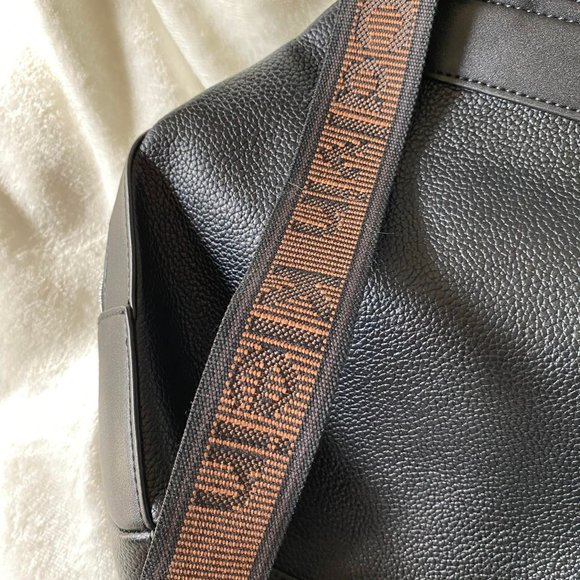 NWOT Calvin Klein Millie Black Backpack Purse with Black and Brown Straps